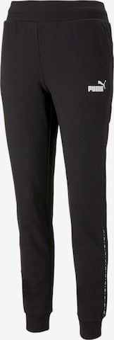 PUMA - Tapered Pantalón deportivo en negro: frente