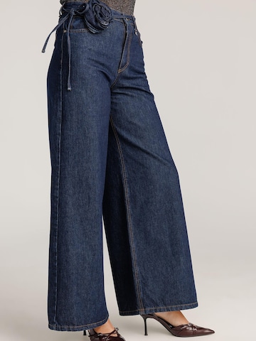 Largi Jeans de la Dixie pe albastru