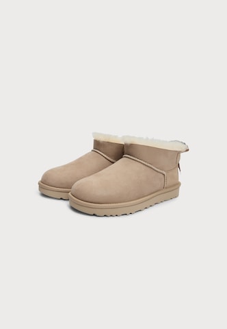 bēšs UGG Klasiski zābaki 'Ultra Mini Bailey Bow'