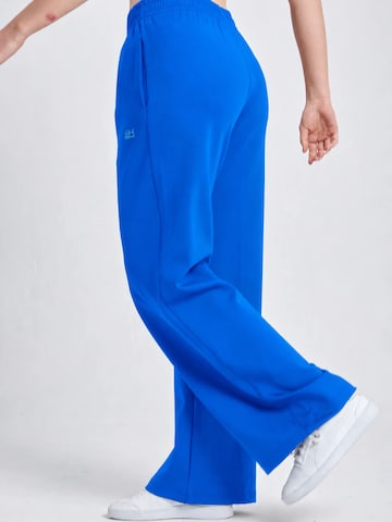 évasé Pantalon de sport 'Wide Training Pants' SPORTKIND en bleu