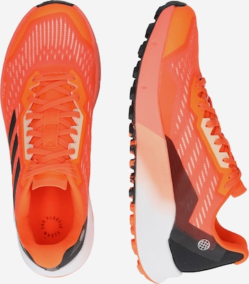 ADIDAS TERREX Juoksukengät 'Agravic Flow 2.0' värissä oranssi