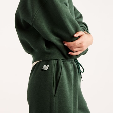 new balance - Pierna ancha Pantalón 'Trackside' en verde
