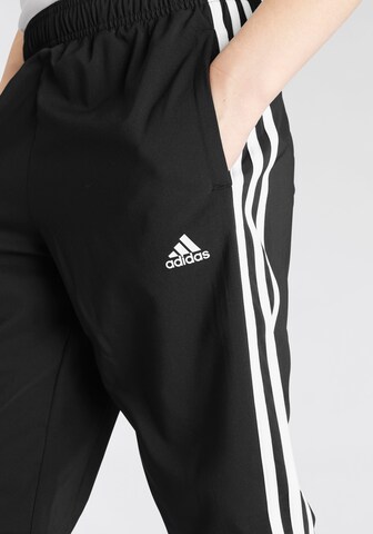 ADIDAS SPORTSWEAR Tapered Παντελόνι φόρμας 'Essentials 3-Stripes ' σε μαύρο