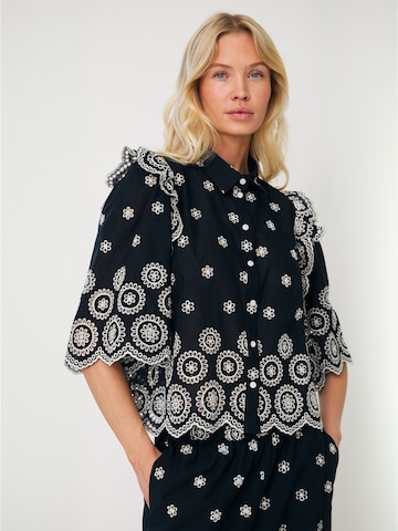 Crās Shirt ' Lysacras ' in Zwart: voorkant