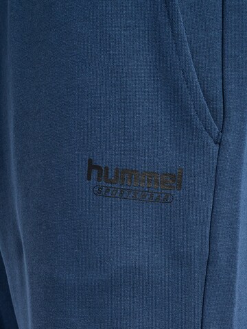 Effilé Pantalon de sport Hummel en bleu