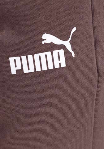 PUMA Конический (Tapered) Спортивные штаны 'Essentials' в Лиловый