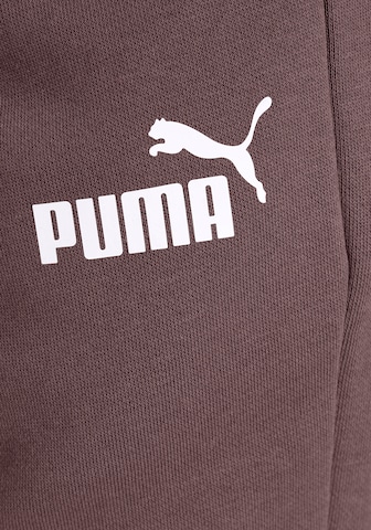 PUMA Tapered Workout Pants 'Essentials' in Purple
