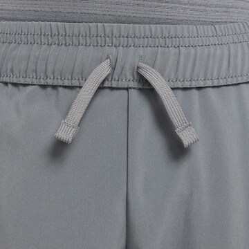 NIKE Regular Sports trousers in Grey