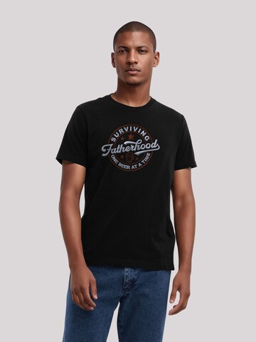 T-Shirt 'Surviving Fatherhood' F4NT4STIC en noir : devant