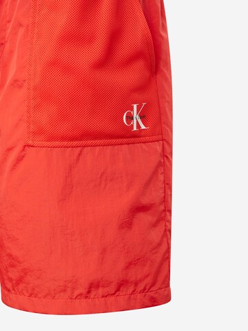 Calvin Klein Jeans Štandardný strih Nohavice - Červená