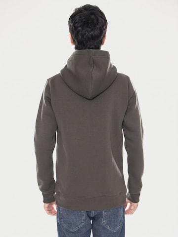 Sweat-shirt 'Logo Hoodie Military Olive' CAT en vert