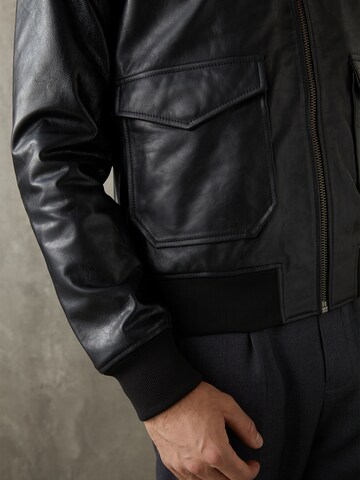 ABOUT YOU x Kevin Trapp Between-Season Jacket 'Arvid' in Black