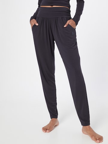 CURARE Yogawear Tapered Sportsbukser i blå: forside