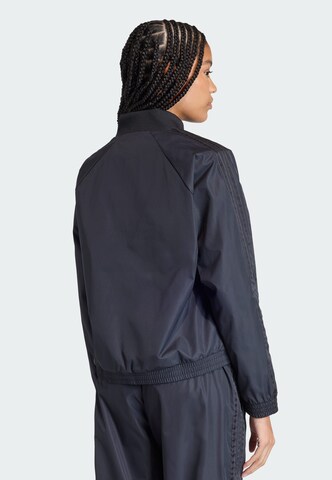 ADIDAS ORIGINALS Jacke in Schwarz