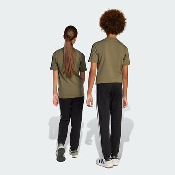 ADIDAS SPORTSWEAR Tapered Παντελόνι φόρμας 'Essentials' σε μαύρο