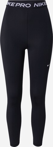 NIKE Skinny Workout Pants in Black: front