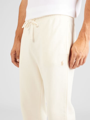 Tapered Pantaloni de la Polo Ralph Lauren pe bej