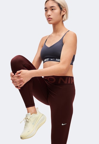 sarkans NIKE Šaurs Sporta bikses: no sāniem