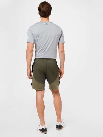 regular Pantaloni sportivi di UNDER ARMOUR in verde