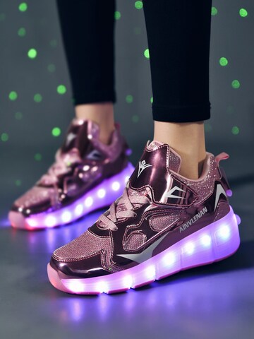 HUSKSWARE Inline and Roller Skates 'Blitz' in Pink: front