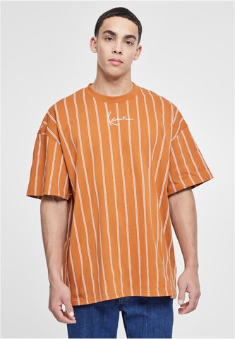 T-Shirt Karl Kani en orange : devant