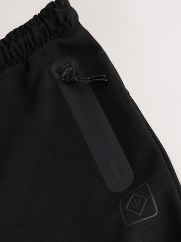 Next Tapered Bukser 'Athleisure' i sort