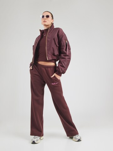 Nike Sportswear Loose fit Trousers 'PHNX FLC' in Red