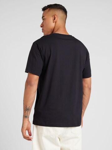 Champion Authentic Athletic Apparel - Camiseta en negro