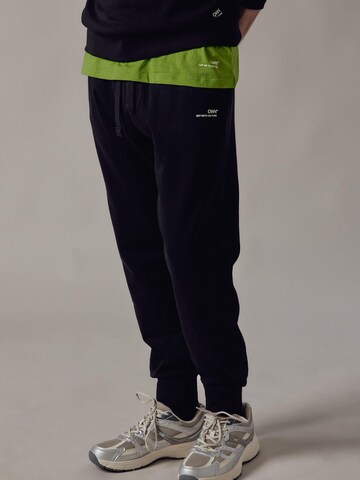 Regular Pantalon 'Joggers' OWN Off With Nature en noir