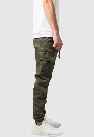 Urban Classics Конический (Tapered) Брюки-карго в Зеленый