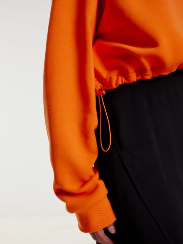 EDITED Sweatshirt 'Ayaka' in Orange