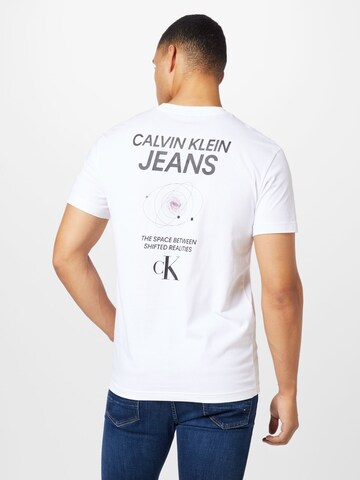 Tricou 'Future Galaxy' de la Calvin Klein Jeans pe alb: față