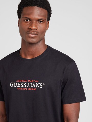 Maglietta di GUESS JEANS in nero