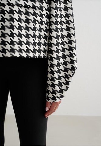 Aim'n Between-season jacket in Black