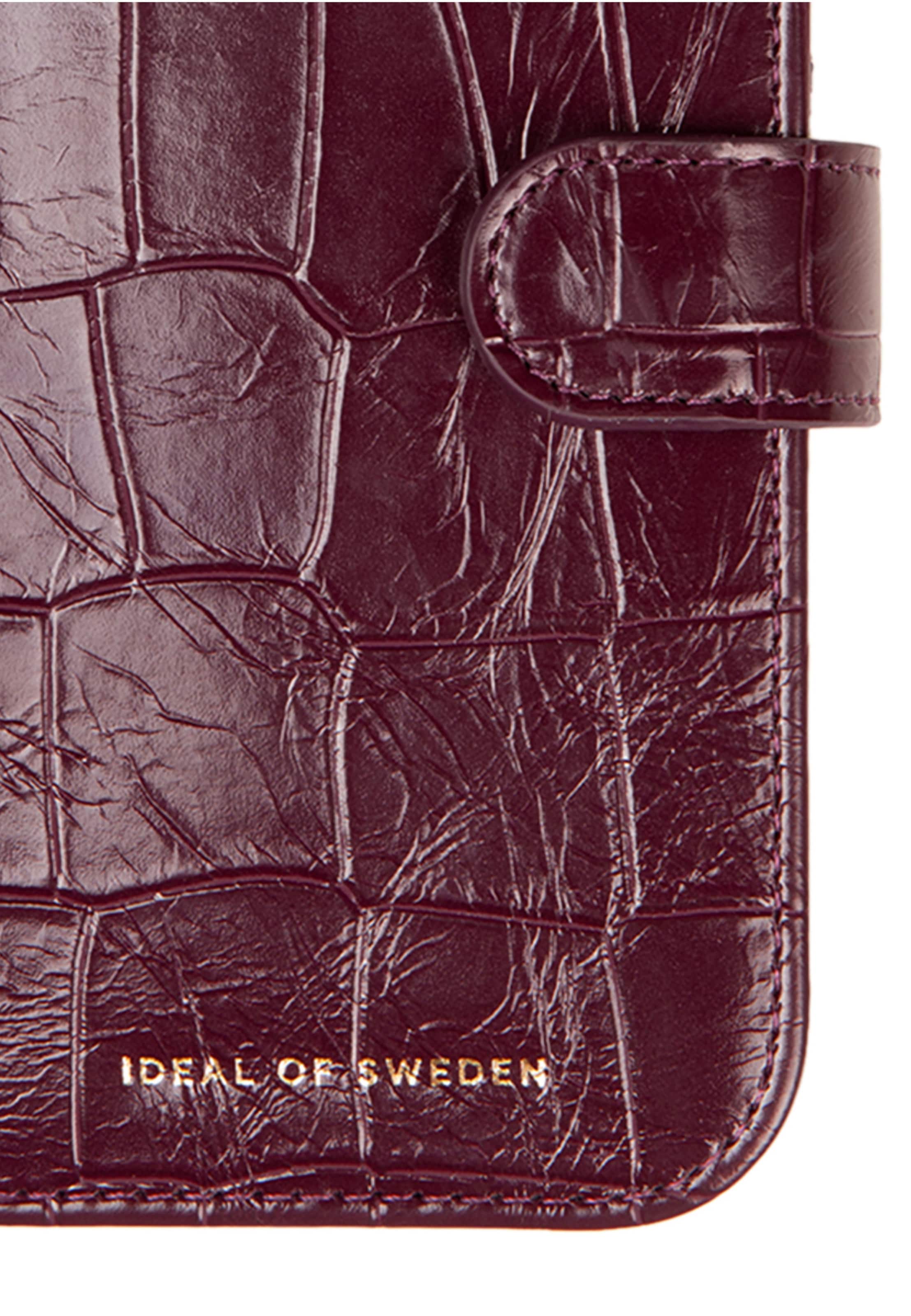 Protection pour smartphone 'iPhone 13 / 14 / 16e / 17e' iDeal of Sweden en rouge