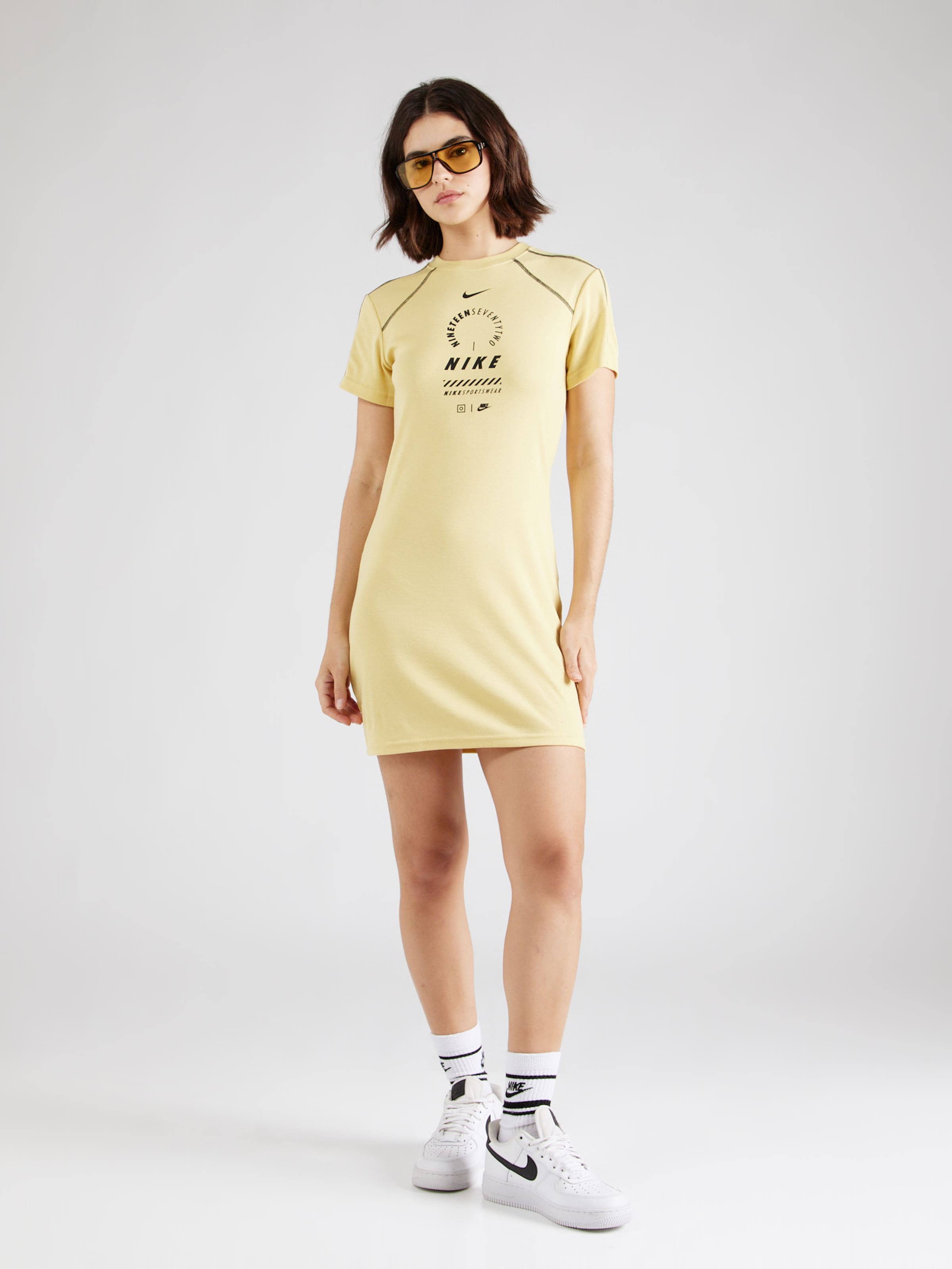 Nike Sportswear Dress in Gold ABOUT YOU
