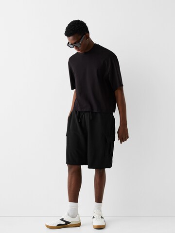 Bershka Loosefit Shorts in Schwarz