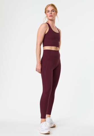 Skinny Pantalon de sport Girlfriend Collective en rouge