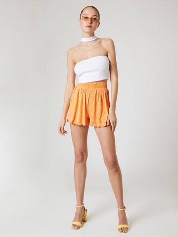 ABOUT YOU x Laura Giurcanu Loosefit Shorts 'Betty' in Orange