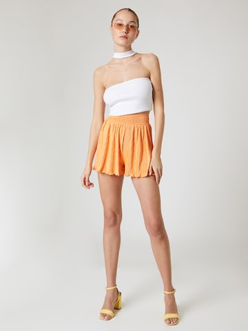 ABOUT YOU x Laura Giurcanu Loosefit Shorts 'Betty' in Orange