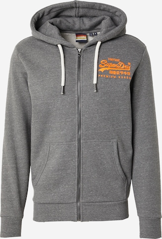 Veste de survêtement Superdry en gris : devant