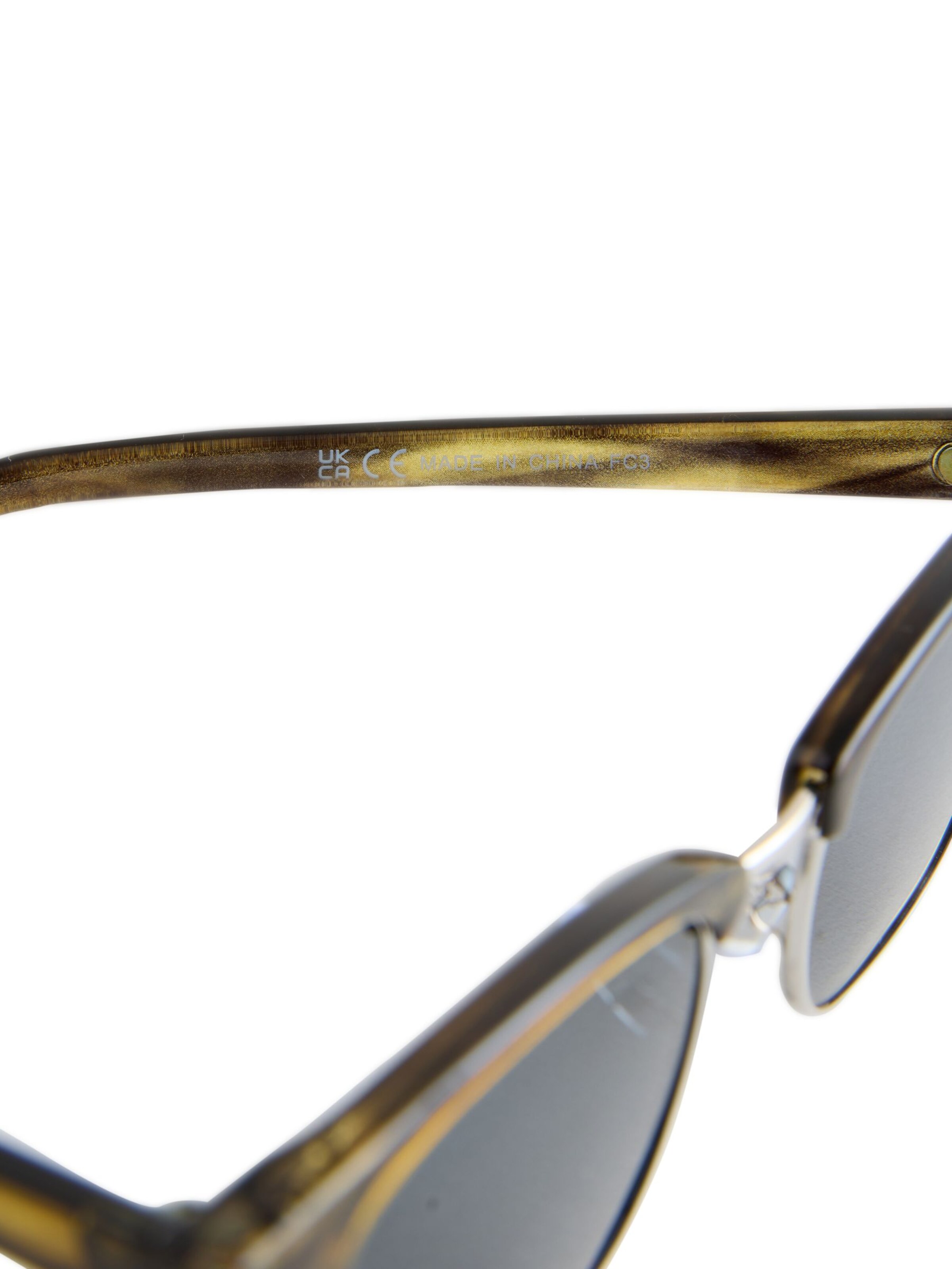 Ochelari de soare de la Next pe verde