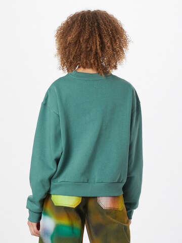 Sweat-shirt 'Amaze' WEEKDAY en vert