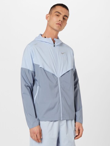 NIKE Athletic Jacket in Blue: front