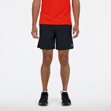 Pantalon de sport new balance en noir : devant