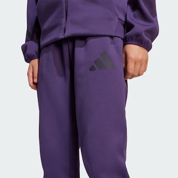 ADIDAS SPORTSWEAR Tapered Sports trousers 'Z.N.E.' in Purple