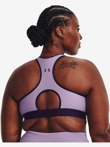 Bustier Soutien-gorge de sport UNDER ARMOUR en violet