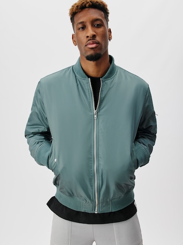 ABOUT YOU x Kingsley Coman Between-Season Jacket 'Colin' in Green: front