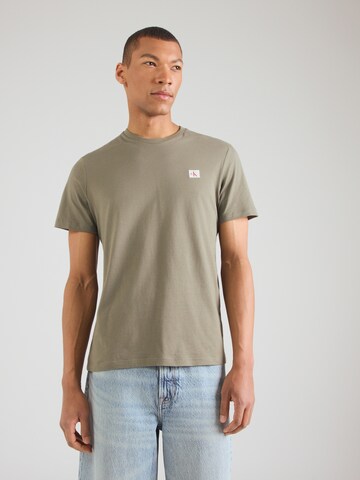 Calvin Klein Jeans T-shirt i grön: framsida