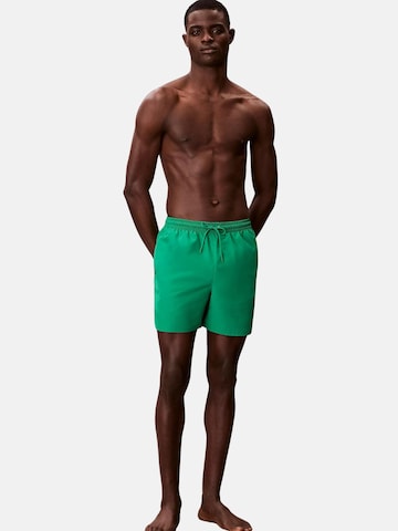 Shorts de bain 'CALVIN KLEIN MEDIUM DRAWSTRING Costumi da bagno' Calvin Klein en vert